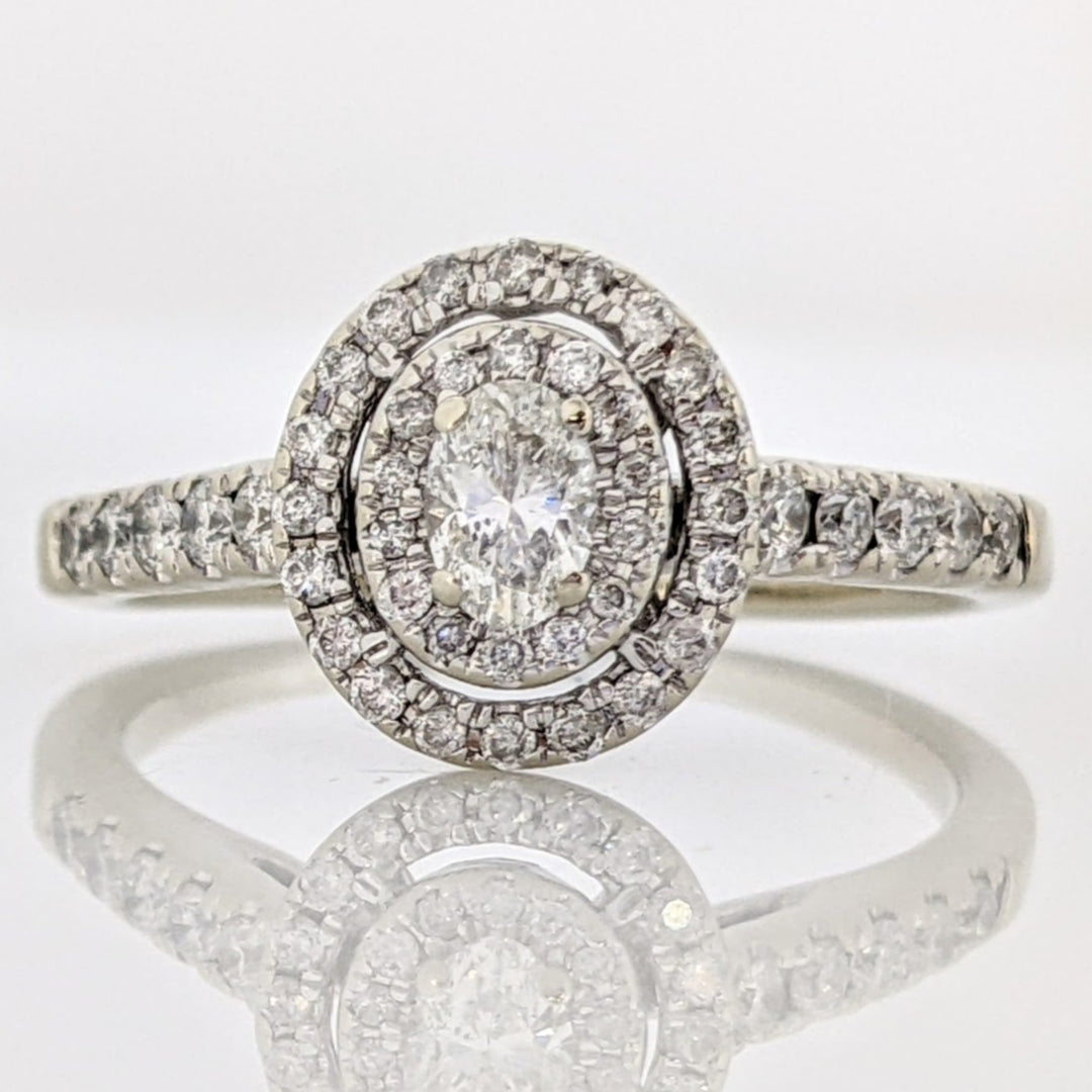 14K WHITE .59 CARAT TOTAL WEIGHT I1 H DIAMOND OVAL (1) ROUND (45) ESTATE HALO RING 2.9 GRAMS