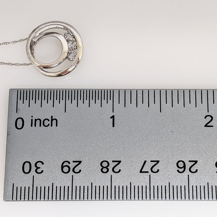 10K WHITE .20 CARAT TOTAL WEIGHT I1 I DIAMOND ROUND (3) SWIRL CIRCLE ESTATE PENDANT & CHAIN 1.7 GRAMS