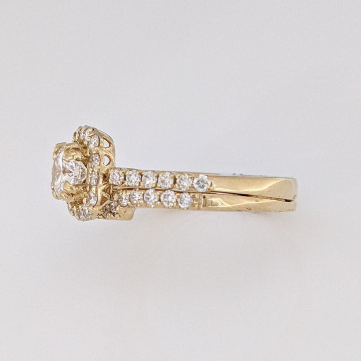 14K .60 CARAT TOTAL SI1 F DIAMOND ROUND WITH .47 DIAMOND TOTAL WEIGHT MOUNTING AND .23 DIAMOND TOTAL WEIGHT BAND ESTATE SET 4.5 GRAMS