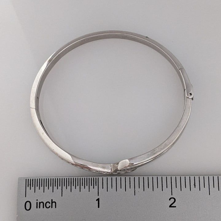 18K WHITE .72 CARAT TOTAL WIEGHT SI1 H DIAMOND ROUND (12) BYPASS CHANNEL SET ESTATE BANGLE 15.3 GRAMS