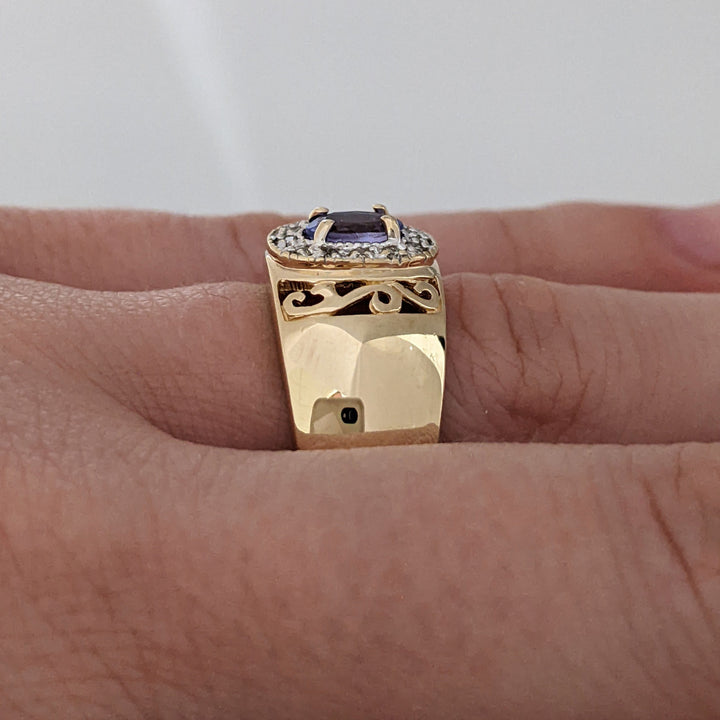 14K TANZANITE OVAL 3X5 WITH .12 DIAMOND TOTAL WEIGHT (12) ESTATE RING 5.5 GRAMS