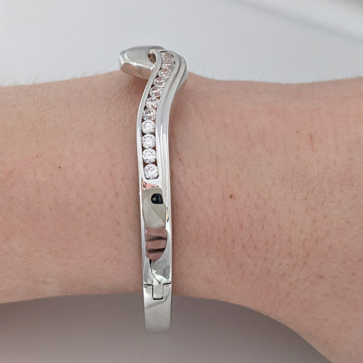 18K WHITE .72 CARAT TOTAL WIEGHT SI1 H DIAMOND ROUND (12) BYPASS CHANNEL SET ESTATE BANGLE 15.3 GRAMS