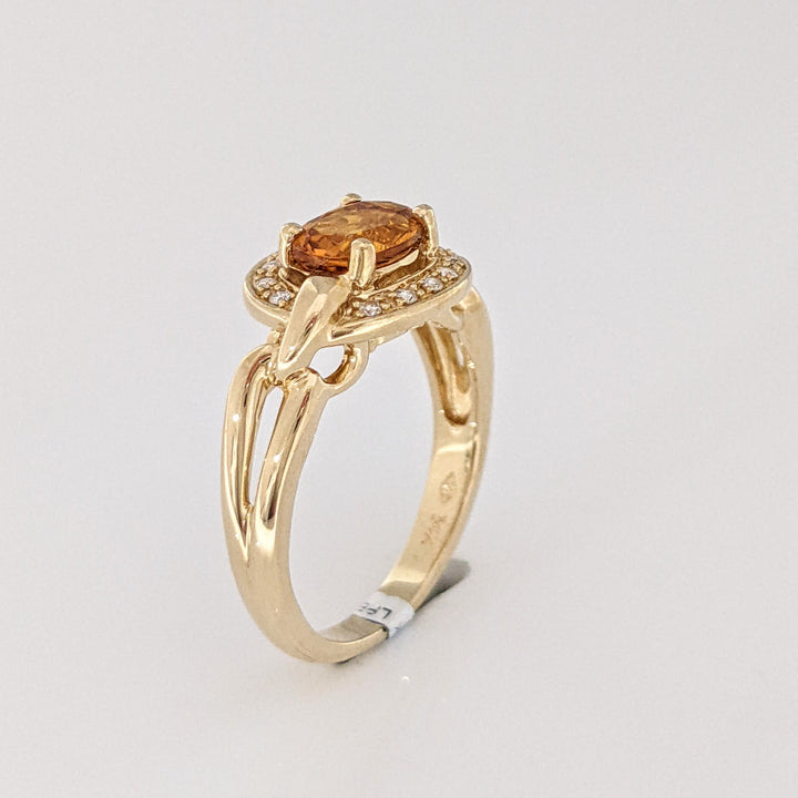 14K CITRINE OVAL 6X8 WITH (12) MELEE ESTATE RING 5.0 GRAMS