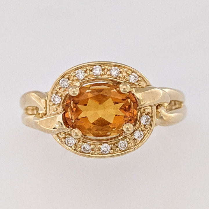 14K CITRINE OVAL 6X8 WITH (12) MELEE ESTATE RING 5.0 GRAMS