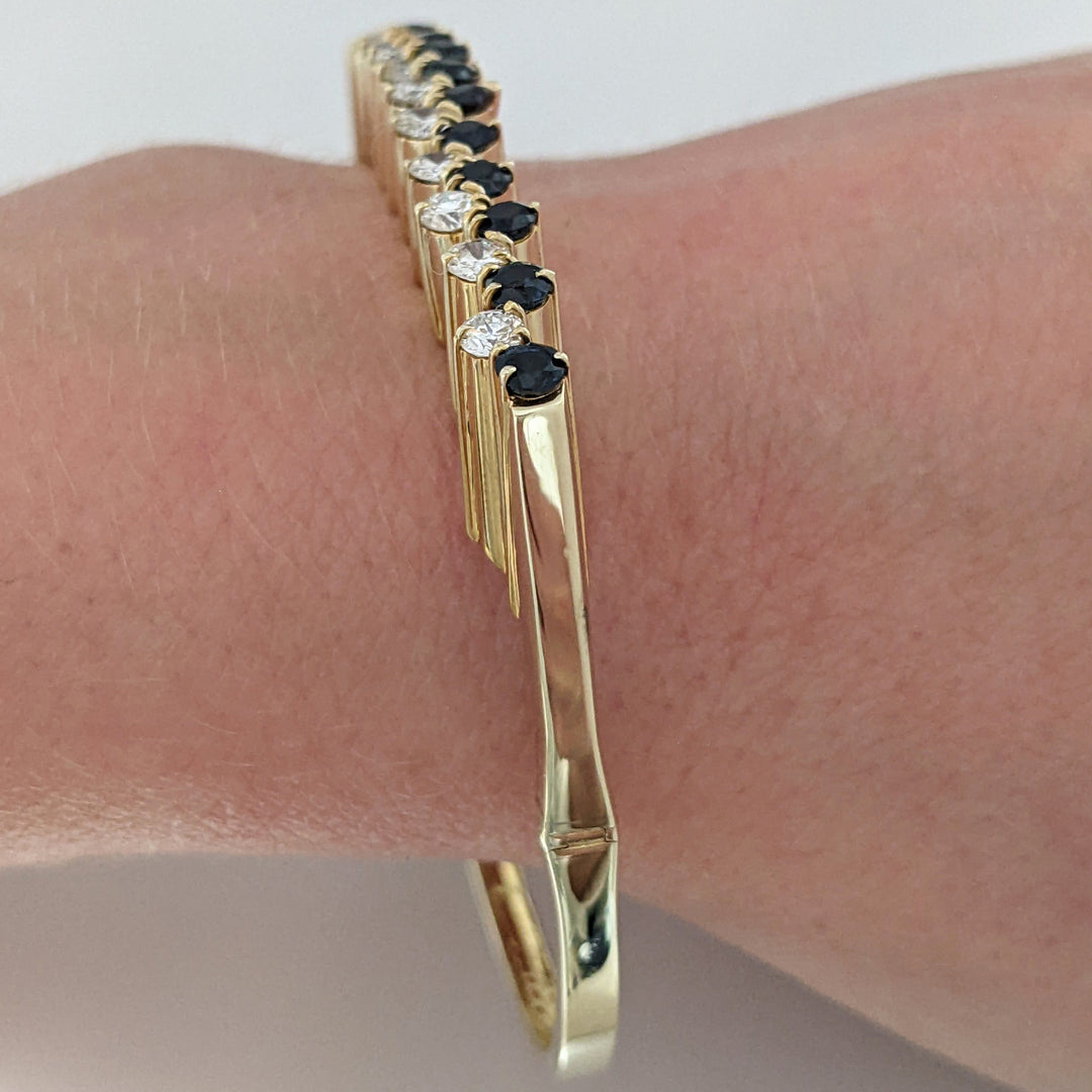 14K 1.10 CARAT TOTAL WEIGHT VS2 J DIAMOND ROUND (10) 1.00CTW SAPPHIRE ROUND (10) ESTATE BANGLE 14.6 GRAMS