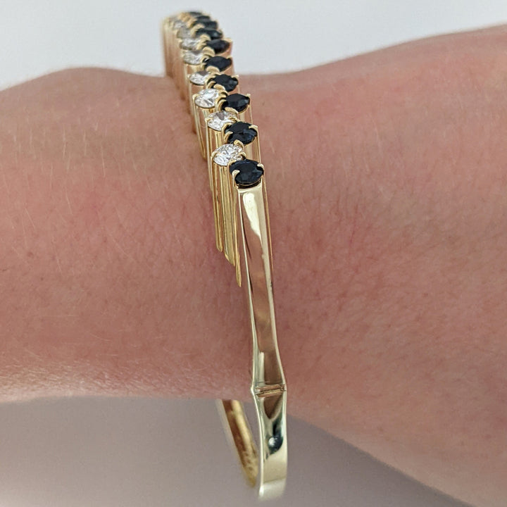 14K 1.10 CARAT TOTAL WEIGHT VS2 J DIAMOND ROUND (10) 1.00CTW SAPPHIRE ROUND (10) ESTATE BANGLE 14.6 GRAMS