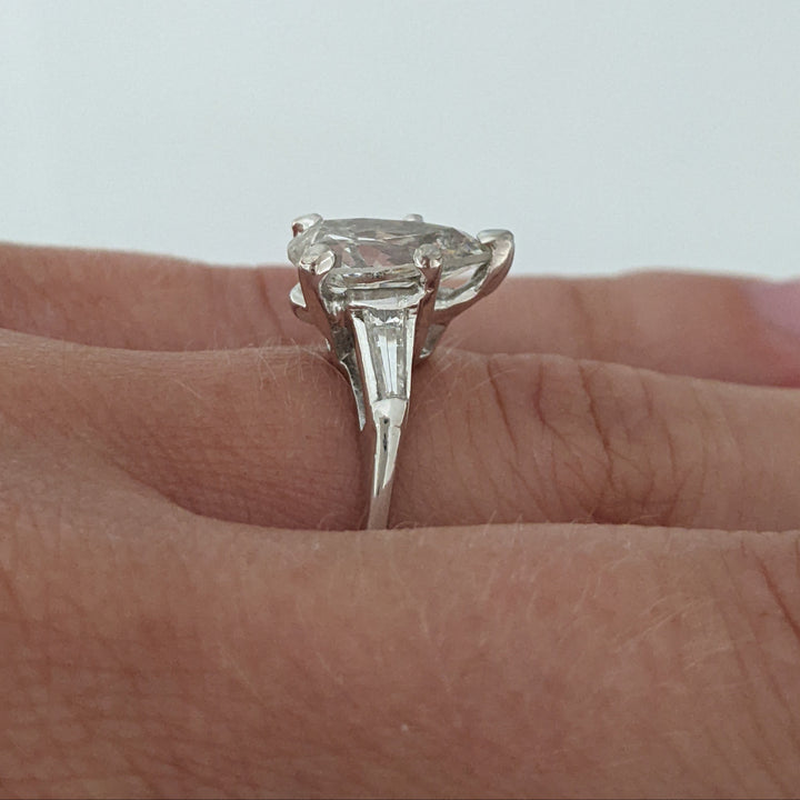 PLATINUM 2.13 CARAT TOTAL I1 G DIAMOND PEAR WITH (2) BAGUETTE ESTATE RING 4.8 GRAMS