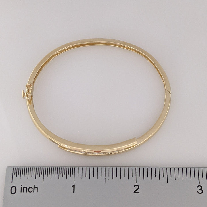 14K .54 CARAT TOTAL WEIGHT VS2 J DIAMOND ROUND (9) BYPASS CHANNEL SET ESTATE BANGLE 14.4 GRAMS