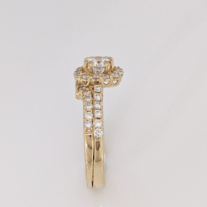 14K .60 CARAT TOTAL SI1 F DIAMOND ROUND WITH .47 DIAMOND TOTAL WEIGHT MOUNTING AND .23 DIAMOND TOTAL WEIGHT BAND ESTATE SET 4.5 GRAMS