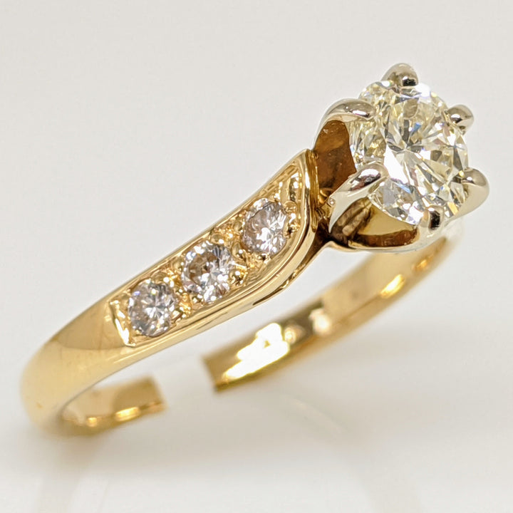 14K .62 CARAT TOTAL WEIGHT VS2 J DIAMOND OVAL WITH (6) ROUND MELEE ESTATE RING