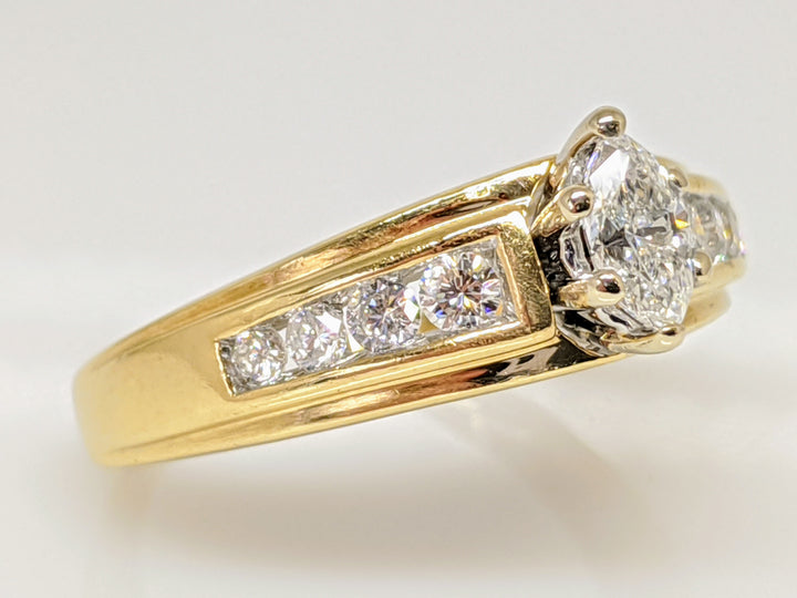 14K .50 CARAT TOTAL WEIGHT I1 I DIAMOND MARQUISE WITH (8) ROUND ESTATE RING 3.7 GRAMS