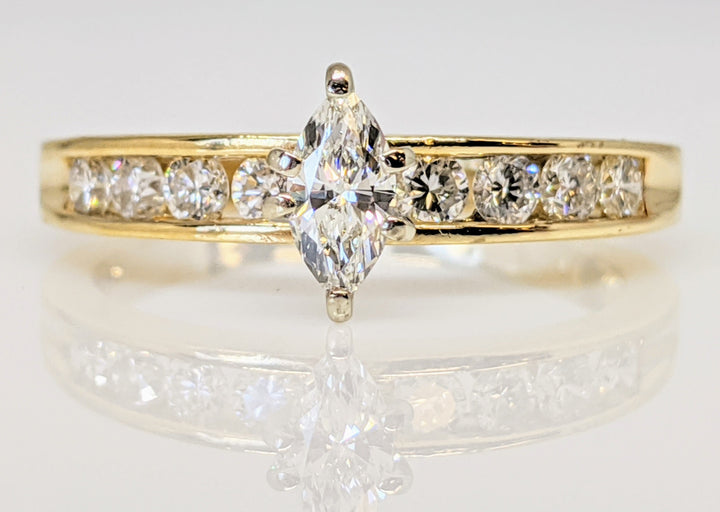 14K .65 CARAT TOTAL WEIGHT SI2 H DIAMOND MARQUISE WITH (8) ROUND ESTATE RING 2.7 GRAMS