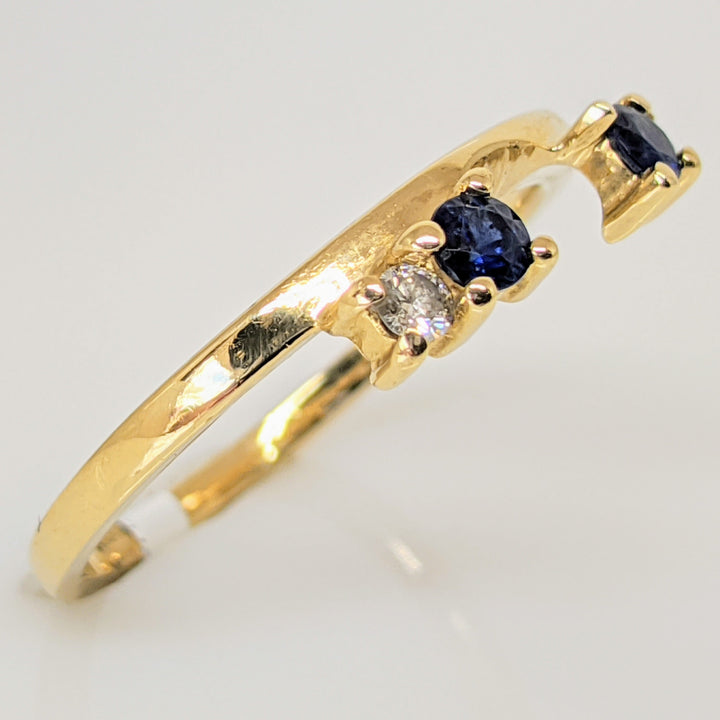 14K SAPPHIRE ROUND (2) 3MM WITH (2) DIAMOND ROUND MELEE ESTATE WRAP 2.2 GRAMS
