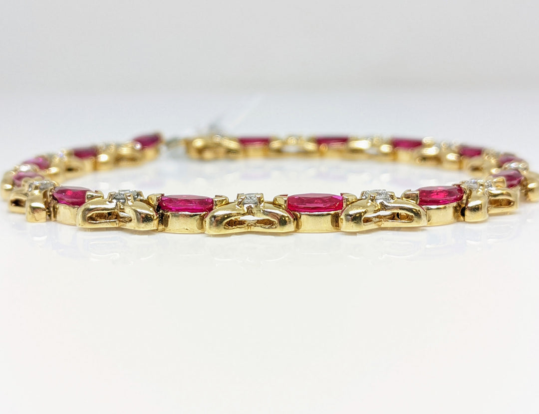 10K SYNTHETIC RUBY MARQUISE CUT 3.5X7 WITH .70 DIAMOND TOTAL WEIGHT ESTATE BRACELET 15.8 GRAMS