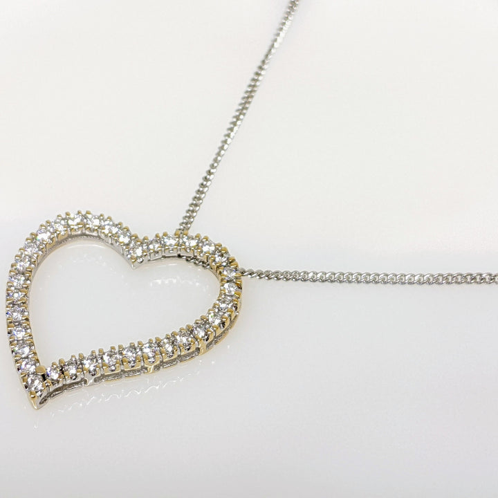 18K WHITE 1.02 CARAT TOTAL WEIGHT SI2-I1 F DIAMOND ROUND (34) ESTATE HEART PENDANT & 14K CHAIN