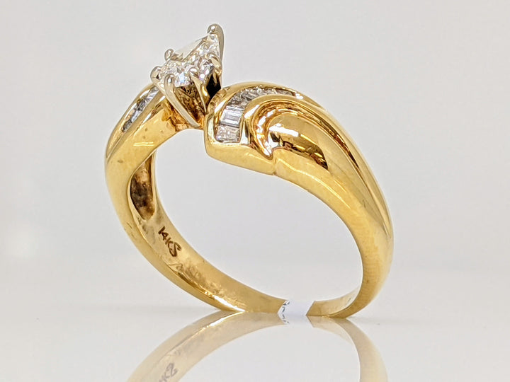 14K .33 CARAT TOTAL SI I MODIFIED PEAR DIAMOND WITH (13) BAGUETTE ESTATE RING 4.1 GRAMS