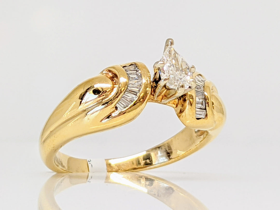 14K .33 CARAT TOTAL SI I MODIFIED PEAR DIAMOND WITH (13) BAGUETTE ESTATE RING 4.1 GRAMS