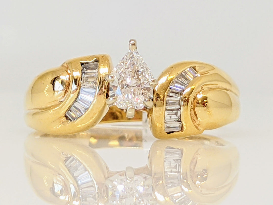 14K .33 CARAT TOTAL SI I MODIFIED PEAR DIAMOND WITH (13) BAGUETTE ESTATE RING 4.1 GRAMS