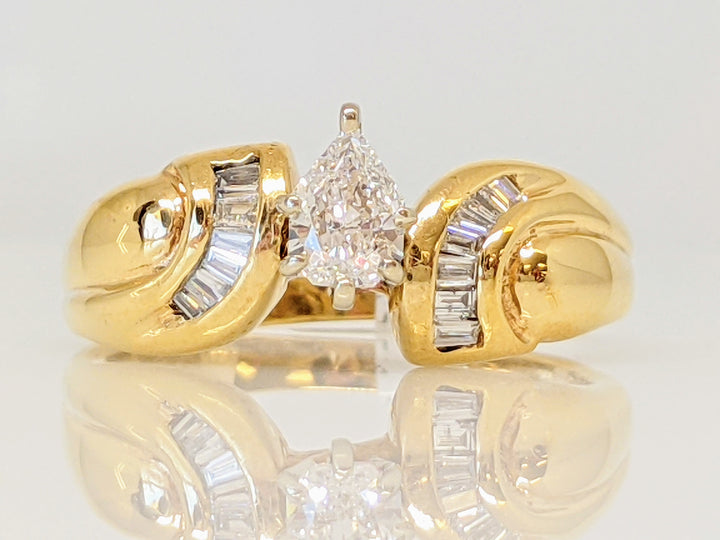 14K .33 CARAT TOTAL SI I MODIFIED PEAR DIAMOND WITH (13) BAGUETTE ESTATE RING 4.1 GRAMS