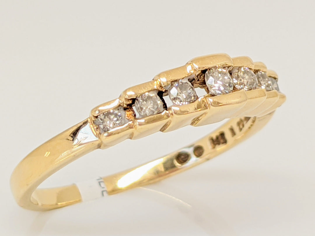 14K .70 CARAT TOTAL WEIGHT I1 L DIAMOND ROUND (7) CHANNEL SET ESTATE BAND 2.4 GRAMS