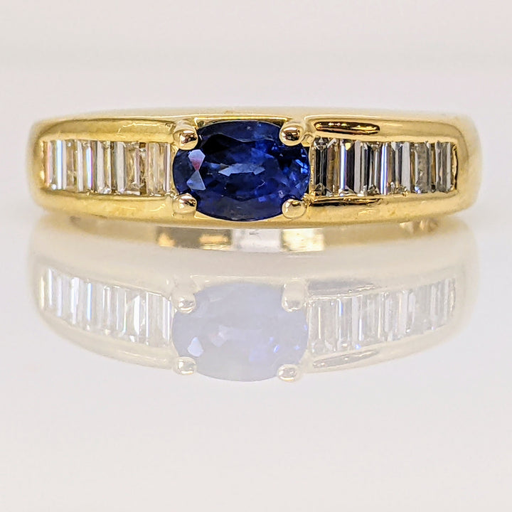 18K SAPPHIRE "AA" OVAL 4X5 WITH (12) BAGUETTE .60 DIAMOND TOTAL WEIGHT ESTATE RING 5.8 GRAMS