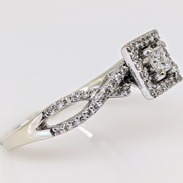 14K WHITE .82 CARAT TOTAL WEIGHT I1 I DIAMOND PRINCESS CUT WITH (56) ROUND MELEE ESTATE RING 4.0 GRAMS