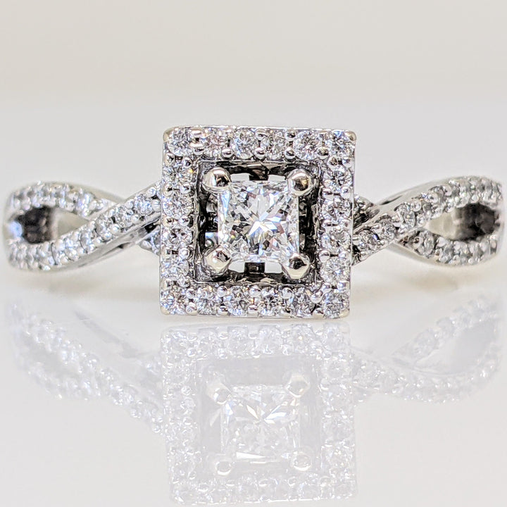 14K WHITE .82 CARAT TOTAL WEIGHT I1 I DIAMOND PRINCESS CUT WITH (56) ROUND MELEE ESTATE RING 4.0 GRAMS