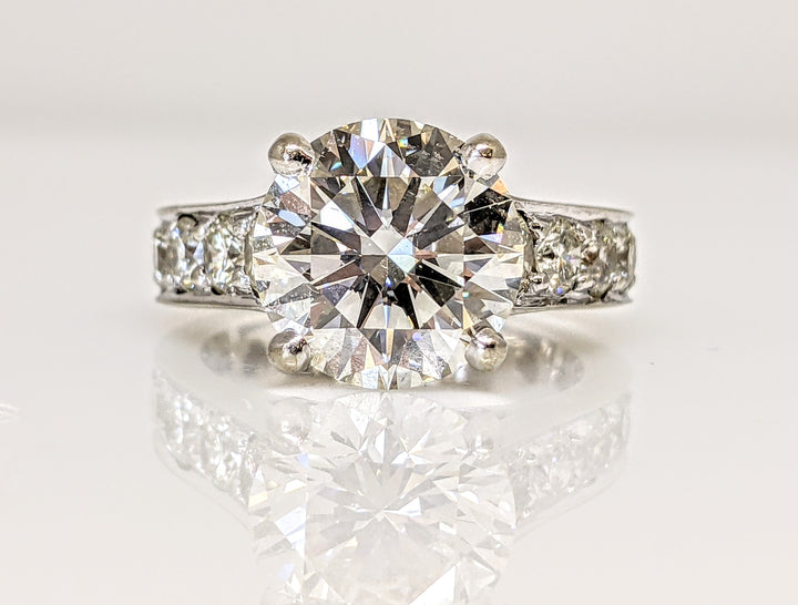 18K WHITE 3.44 CARAT TOTAL SI1 L DIAMOND ROUND WITH 1.32 CARAT TOTAL WEIGHT SI H (14) ESTATE RING 7.0 GRAMS