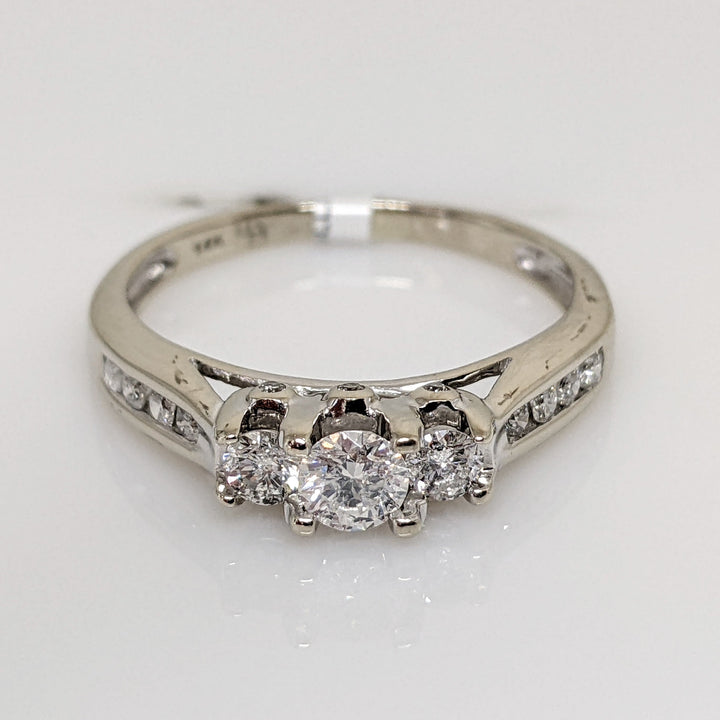 14K WHITE .53 CARAT TOTAL WEIGHT I1 H DIAMOND ROUND (17) TRINITY ESTATE RING 2.4 GRAMS