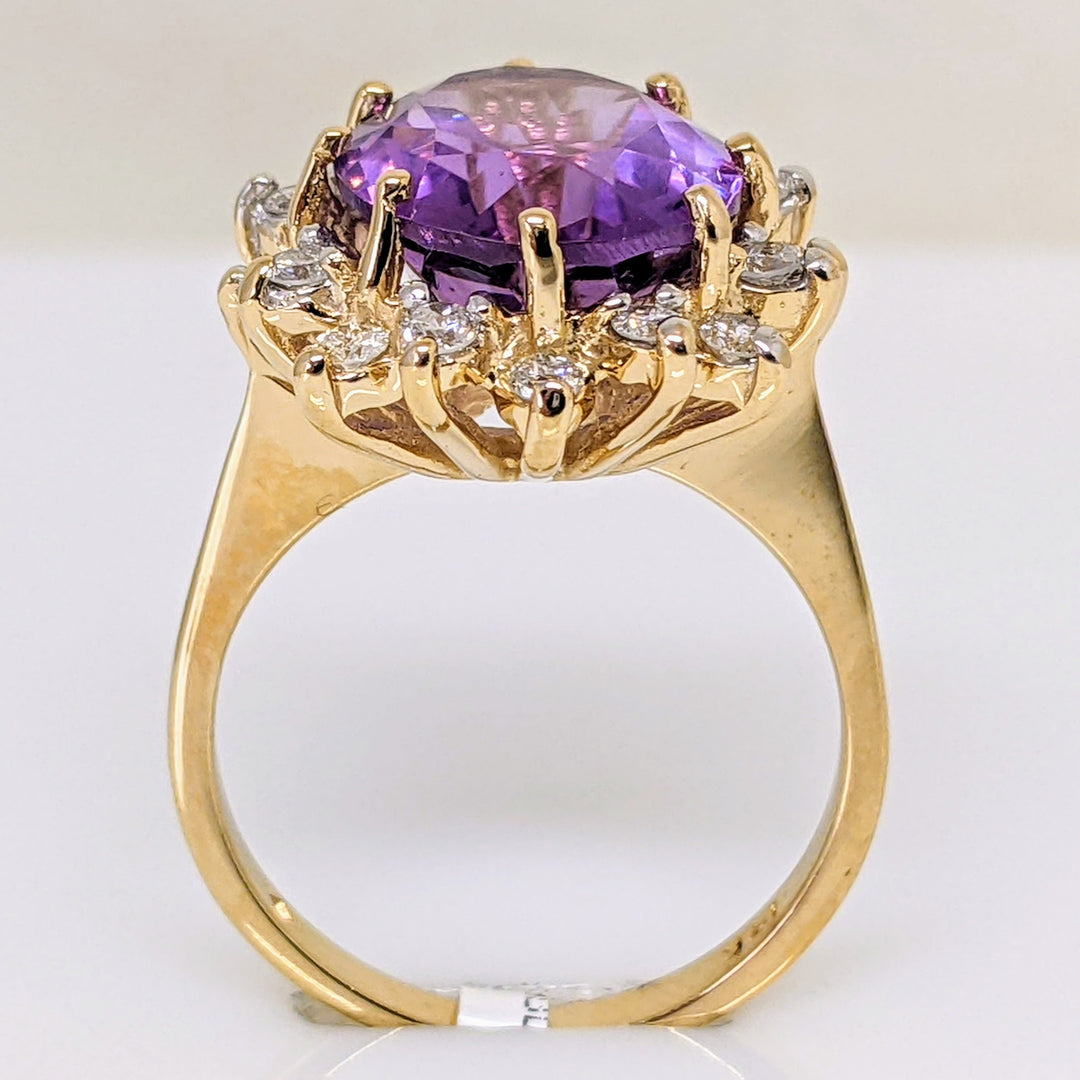 14K AMETHYST OVAL 10X12 WITH (16) ROUND .48 CARAT TOTAL WEIGHT ESTATE RING 4.7 GRAMS