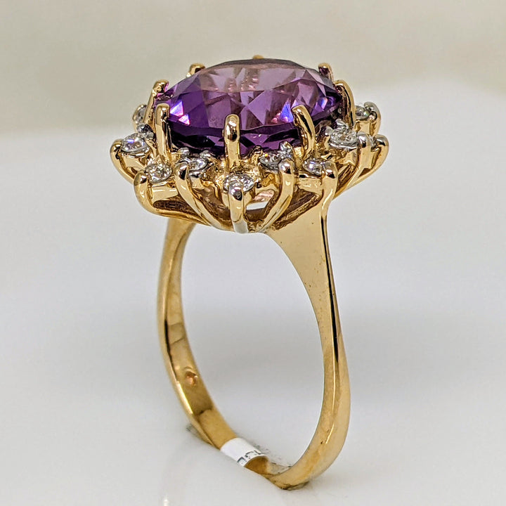 14K AMETHYST OVAL 10X12 WITH (16) ROUND .48 CARAT TOTAL WEIGHT ESTATE RING 4.7 GRAMS