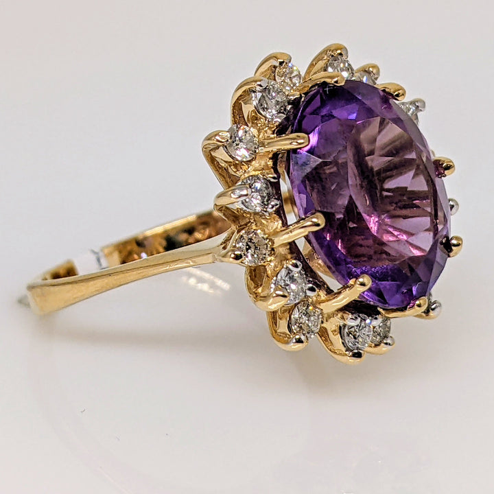14K AMETHYST OVAL 10X12 WITH (16) ROUND .48 CARAT TOTAL WEIGHT ESTATE RING 4.7 GRAMS
