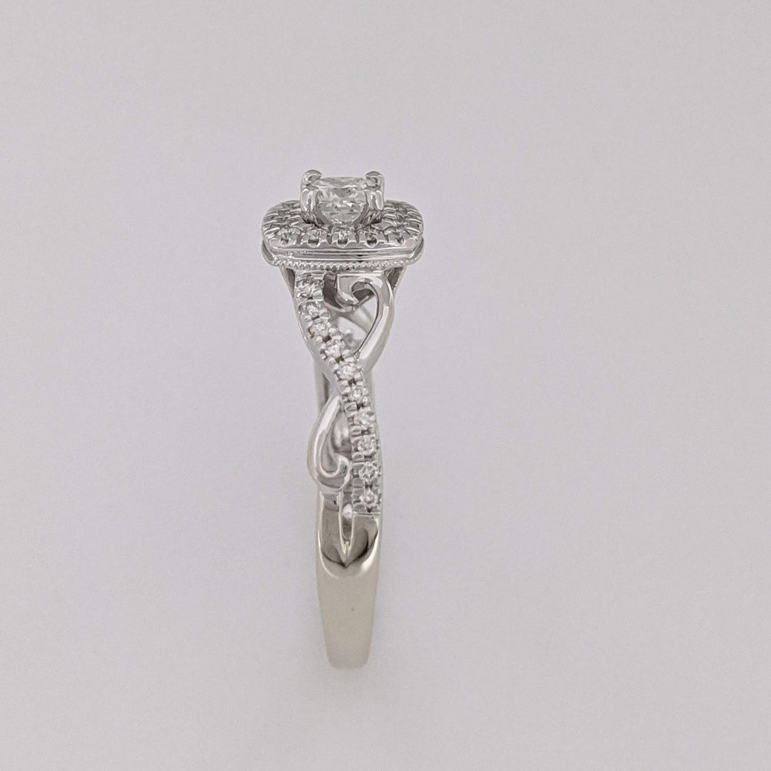 10K WHITE .48 CARAT TOTAL WEIGHT SI2 H DIAMOND PRINCESS CUT (1) ROUND (36) ESTATE HALO TWIST RING 2.8 GRAMS