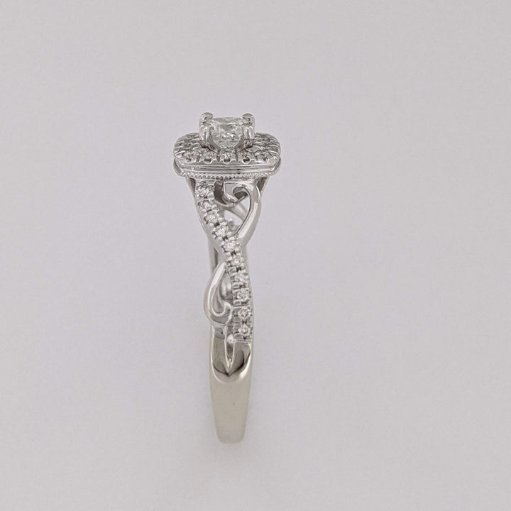 10K WHITE .48 CARAT TOTAL WEIGHT SI2 H DIAMOND PRINCESS CUT (1) ROUND (36) ESTATE HALO TWIST RING 2.8 GRAMS