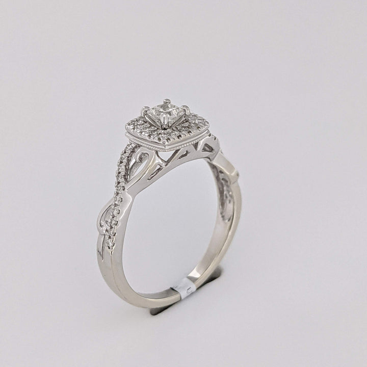10K WHITE .48 CARAT TOTAL WEIGHT SI2 H DIAMOND PRINCESS CUT (1) ROUND (36) ESTATE HALO TWIST RING 2.8 GRAMS