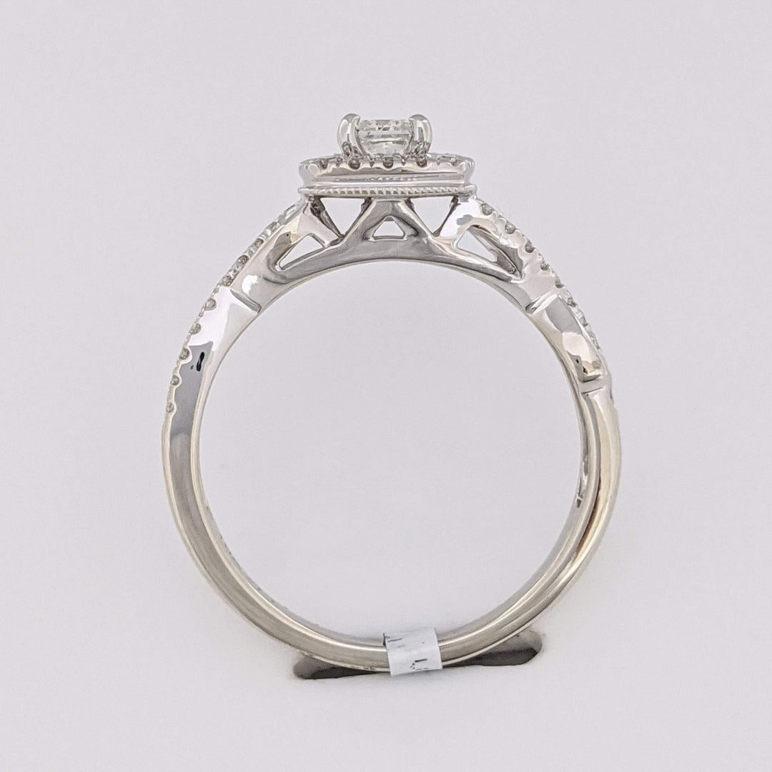 10K WHITE .48 CARAT TOTAL WEIGHT SI2 H DIAMOND PRINCESS CUT (1) ROUND (36) ESTATE HALO TWIST RING 2.8 GRAMS