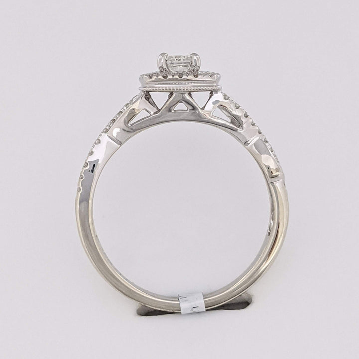 10K WHITE .48 CARAT TOTAL WEIGHT SI2 H DIAMOND PRINCESS CUT (1) ROUND (36) ESTATE HALO TWIST RING 2.8 GRAMS