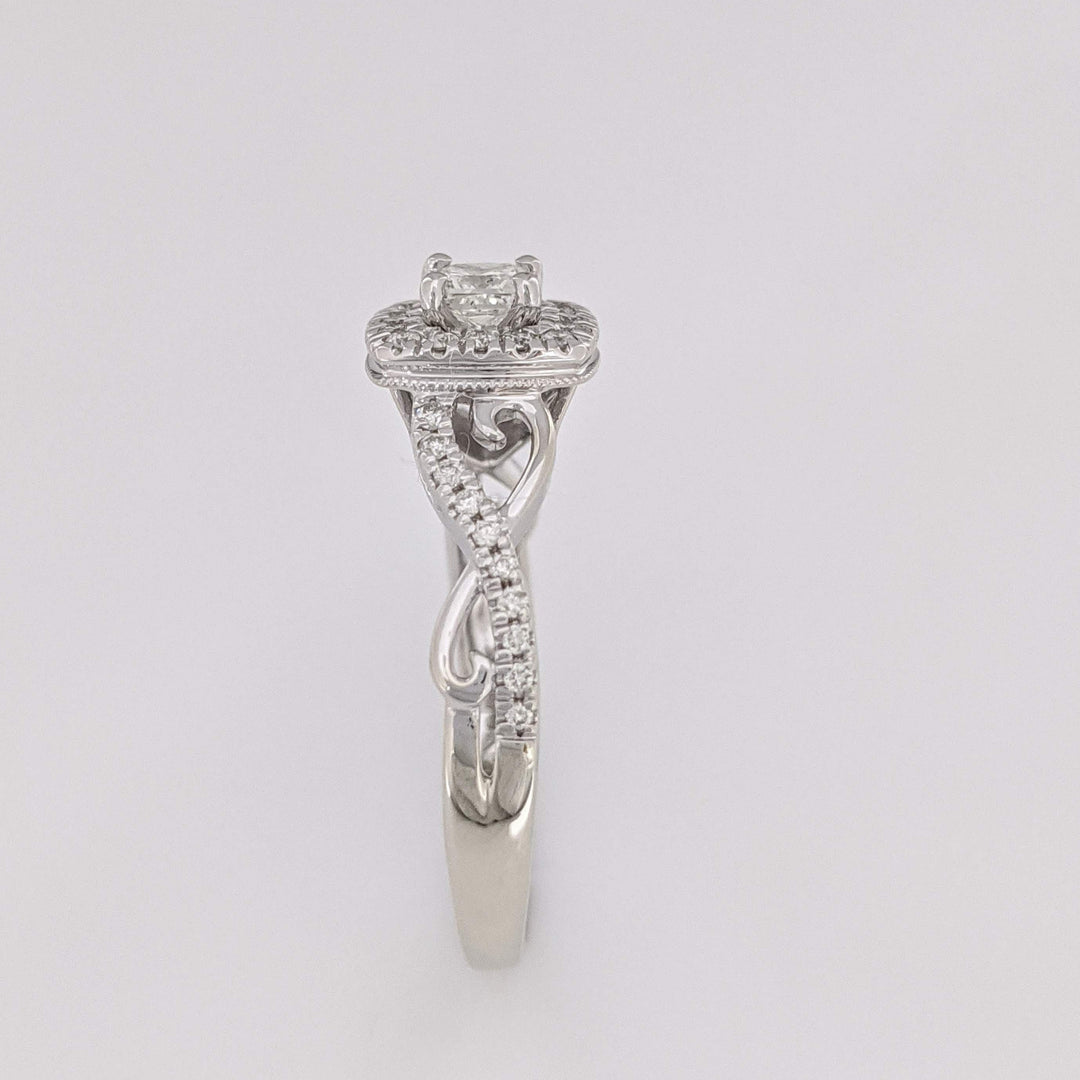 10K WHITE .48 CARAT TOTAL WEIGHT SI2 H DIAMOND PRINCESS CUT (1) ROUND (36) ESTATE HALO TWIST RING 2.8 GRAMS