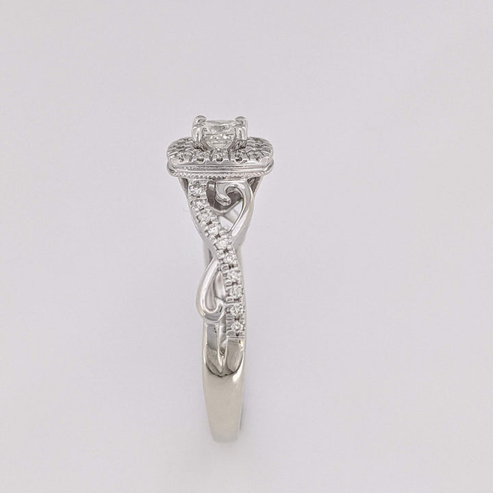 10K WHITE .48 CARAT TOTAL WEIGHT SI2 H DIAMOND PRINCESS CUT (1) ROUND (36) ESTATE HALO TWIST RING 2.8 GRAMS