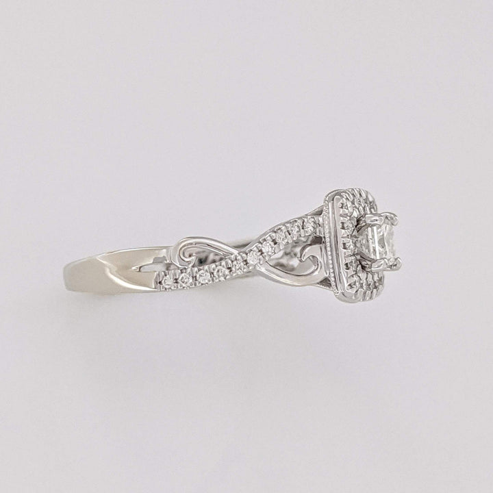 10K WHITE .48 CARAT TOTAL WEIGHT SI2 H DIAMOND PRINCESS CUT (1) ROUND (36) ESTATE HALO TWIST RING 2.8 GRAMS