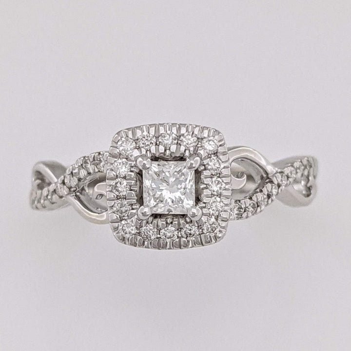 10K WHITE .48 CARAT TOTAL WEIGHT SI2 H DIAMOND PRINCESS CUT (1) ROUND (36) ESTATE HALO TWIST RING 2.8 GRAMS