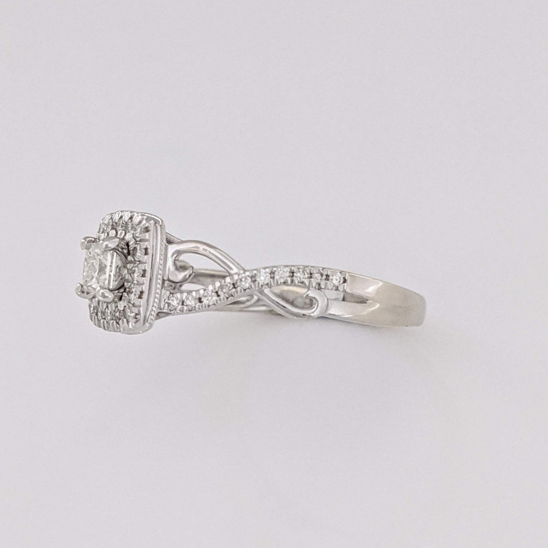 10K WHITE .48 CARAT TOTAL WEIGHT SI2 H DIAMOND PRINCESS CUT (1) ROUND (36) ESTATE HALO TWIST RING 2.8 GRAMS