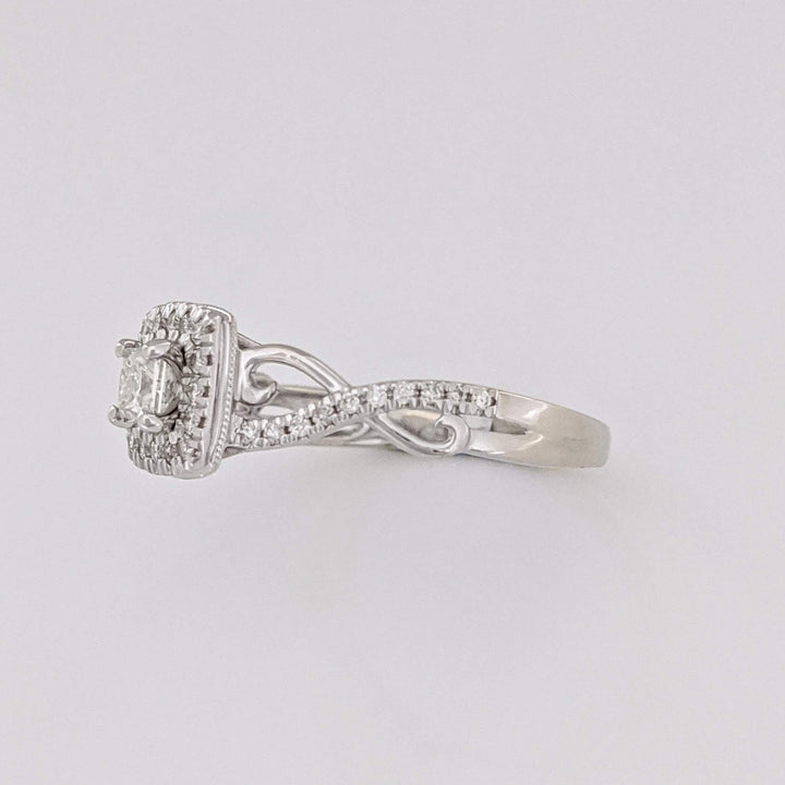 10K WHITE .48 CARAT TOTAL WEIGHT SI2 H DIAMOND PRINCESS CUT (1) ROUND (36) ESTATE HALO TWIST RING 2.8 GRAMS
