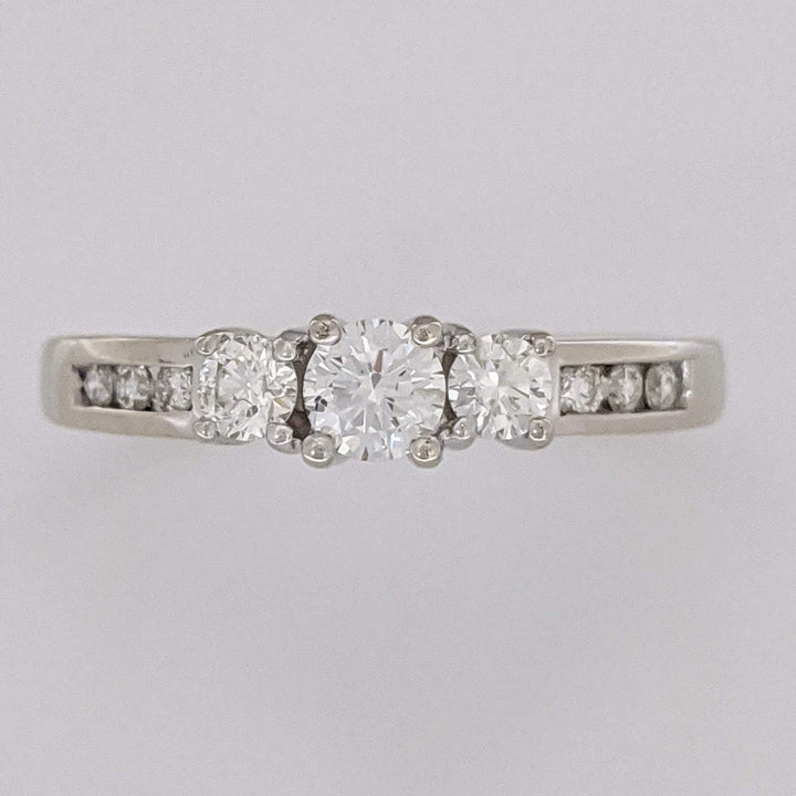 14K WHITE .48 CARAT TOTAL WEIGHT I1 J DIAMOND ROUND (9) ESTATE TRINITY RING 3.2 GRAMS