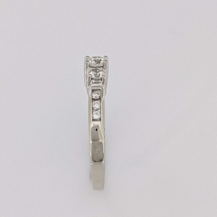 14K WHITE .48 CARAT TOTAL WEIGHT I1 J DIAMOND ROUND (9) ESTATE TRINITY RING 3.2 GRAMS