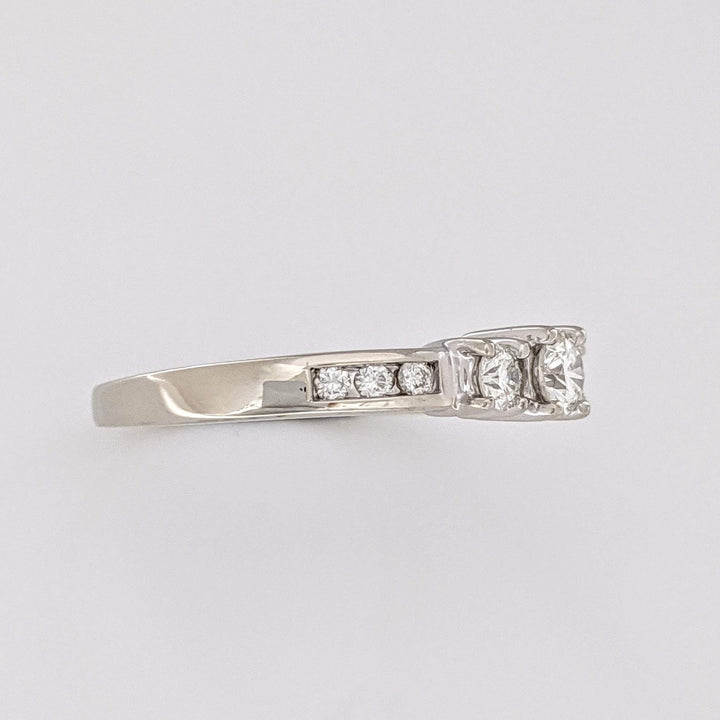 14K WHITE .48 CARAT TOTAL WEIGHT I1 J DIAMOND ROUND (9) ESTATE TRINITY RING 3.2 GRAMS