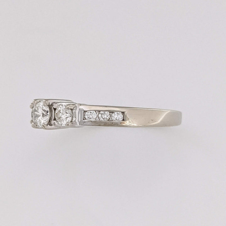 14K WHITE .48 CARAT TOTAL WEIGHT I1 J DIAMOND ROUND (9) ESTATE TRINITY RING 3.2 GRAMS