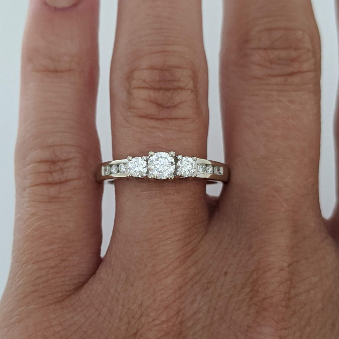 14K WHITE .48 CARAT TOTAL WEIGHT I1 J DIAMOND ROUND (9) ESTATE TRINITY RING 3.2 GRAMS