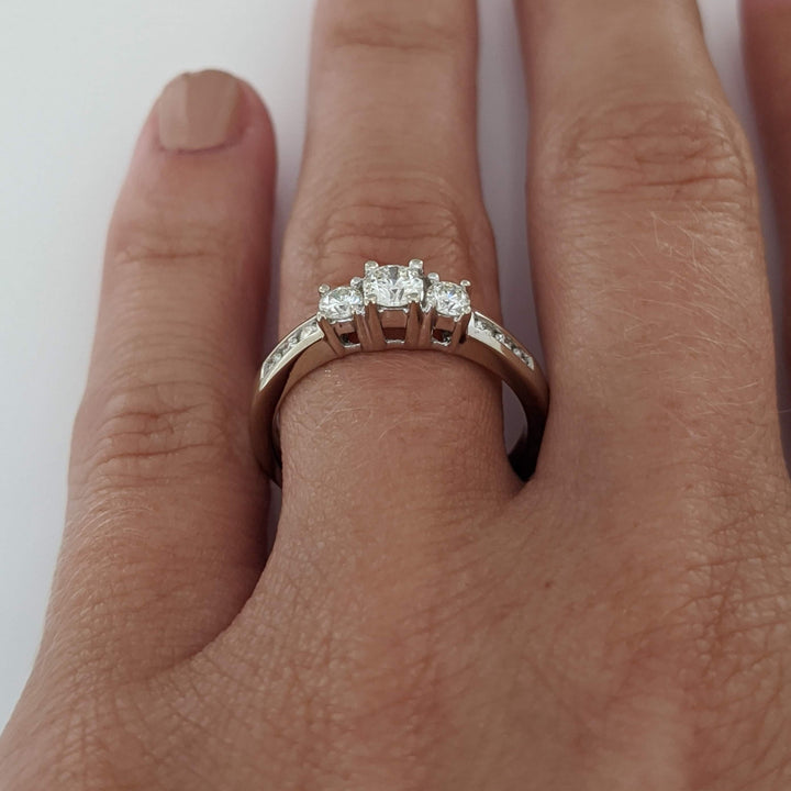 14K WHITE .48 CARAT TOTAL WEIGHT I1 J DIAMOND ROUND (9) ESTATE TRINITY RING 3.2 GRAMS