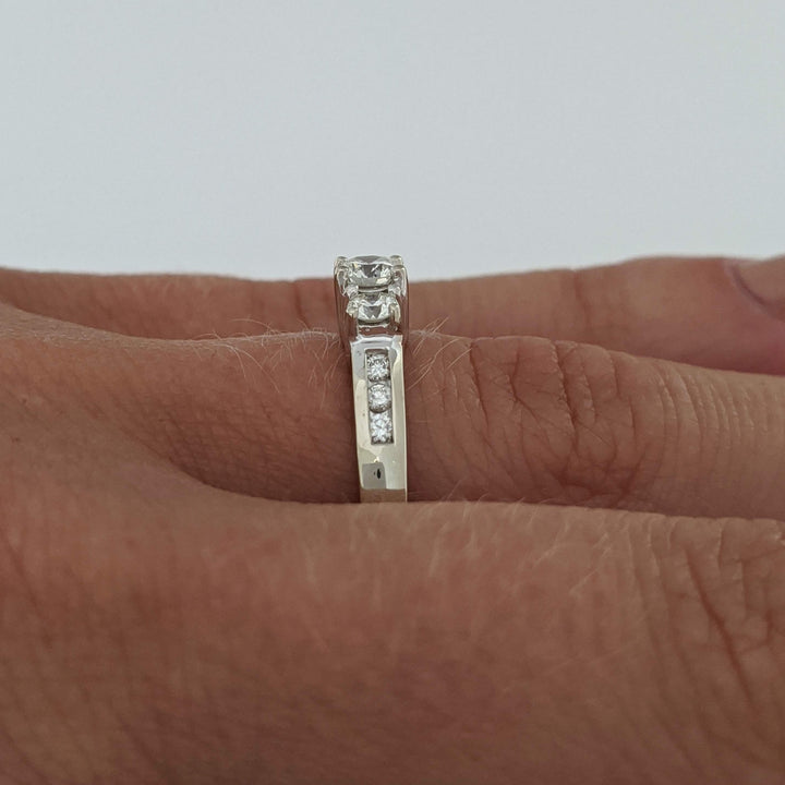 14K WHITE .48 CARAT TOTAL WEIGHT I1 J DIAMOND ROUND (9) ESTATE TRINITY RING 3.2 GRAMS